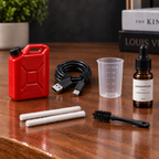 Aromotors accessories: red water filler, USB cable, measuring cup, cotton wicks, cleaning brush and essential oil