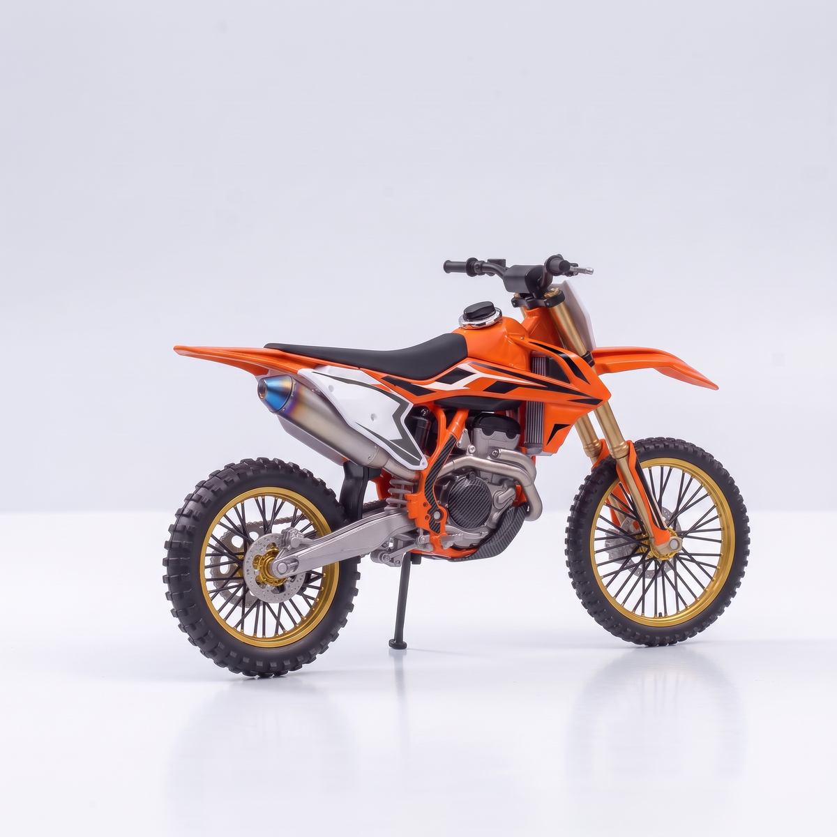 Aromotors orange dirt bike diffuser with fuel-cap water filler on the tank